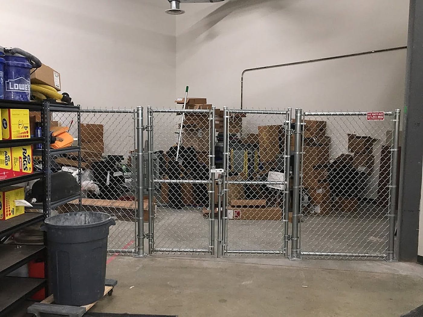 Galvanized chain link enclosure with double swing gates
